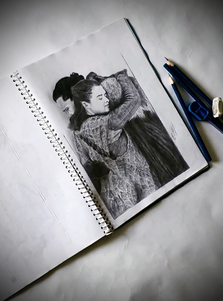 Charcoal portrait sketch of brother and sister